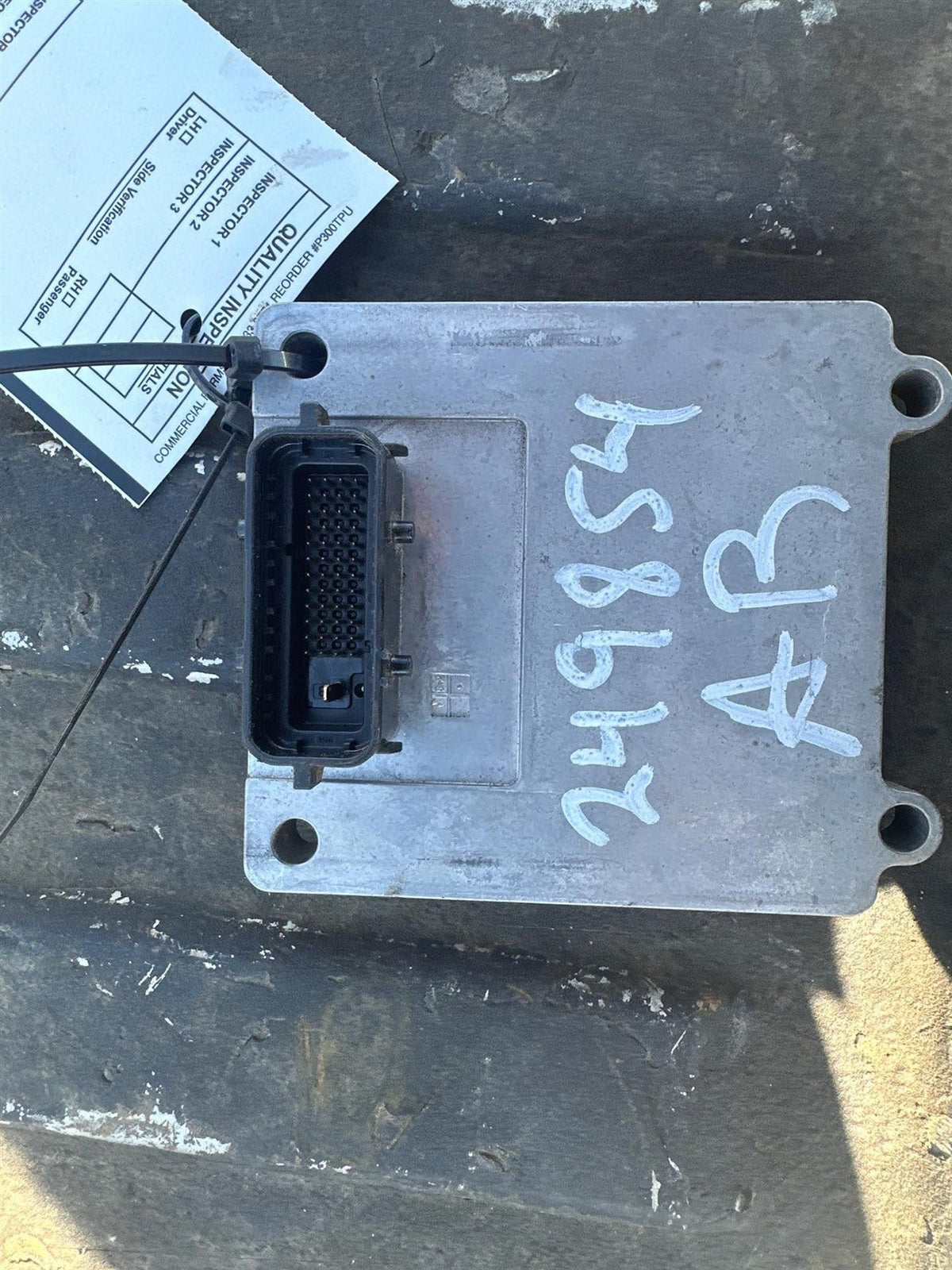 Transmission Control Module (TCM) from a 2006 Chevrolet Impala, photo 1