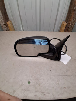 Side View Mirror from a 2002 Chevrolet Suburban 1500, left side, photo 1