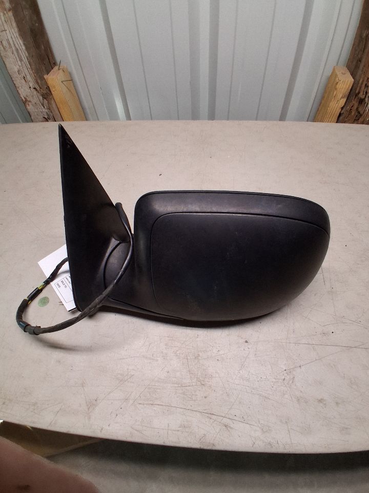 Side View Mirror from a 2002 Chevrolet Suburban 1500, left side, photo 2