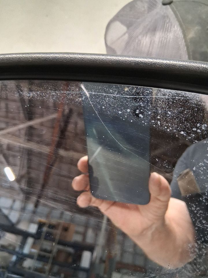 Side View Mirror from a 2002 Chevrolet Suburban 1500, left side, photo 3
