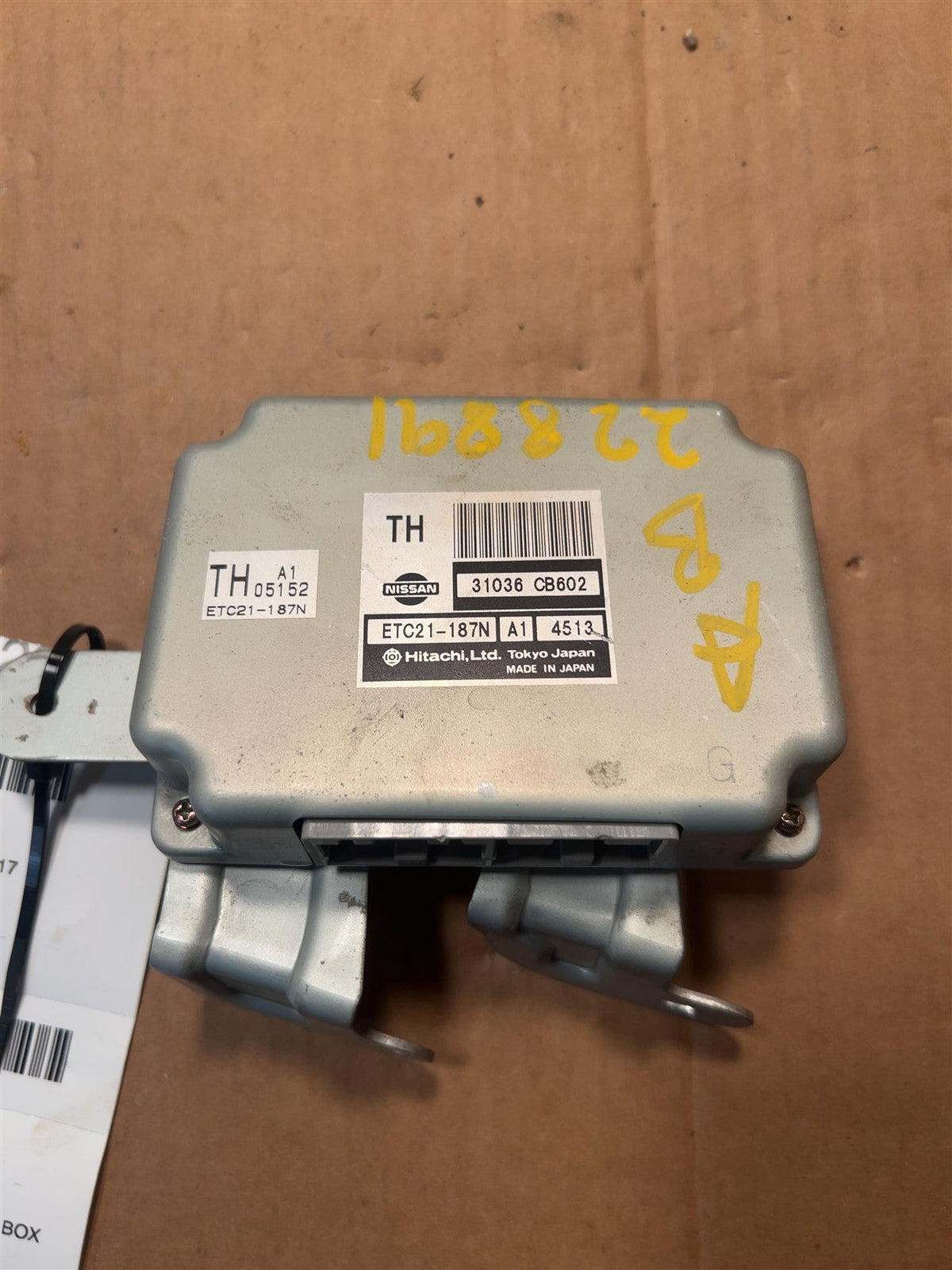 Transmission Control Module (TCM) from a 2004 Nissan Murano, photo 1