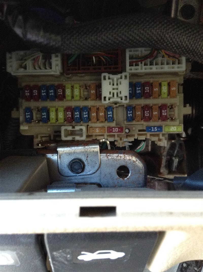 Interior Fuse Box from a 2013 Nissan Altima, photo 1
