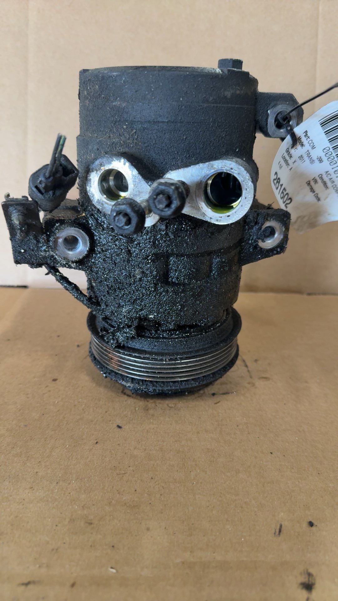 AC Compressor from a 2011 Ford Transit Connect, photo 1