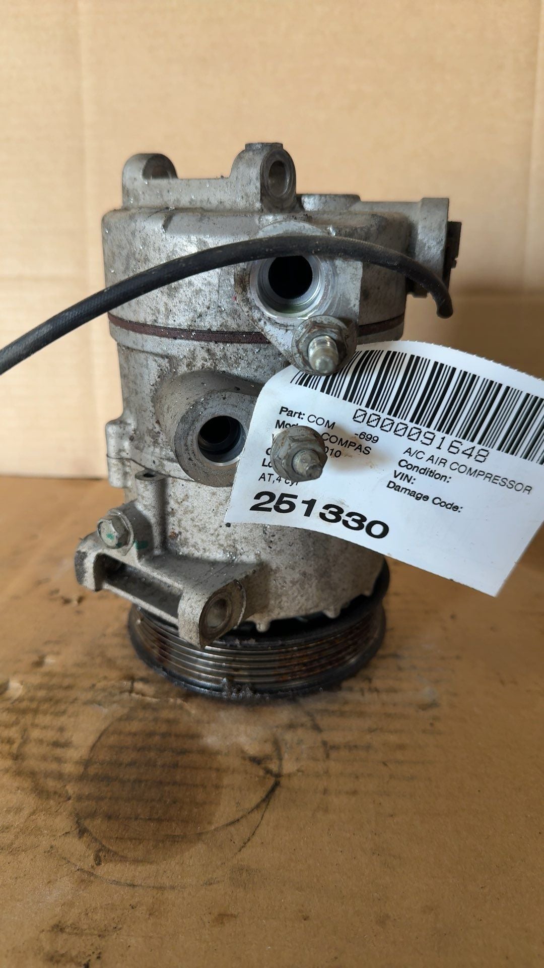 AC Compressor from a 2010 Jeep Compass, photo 1