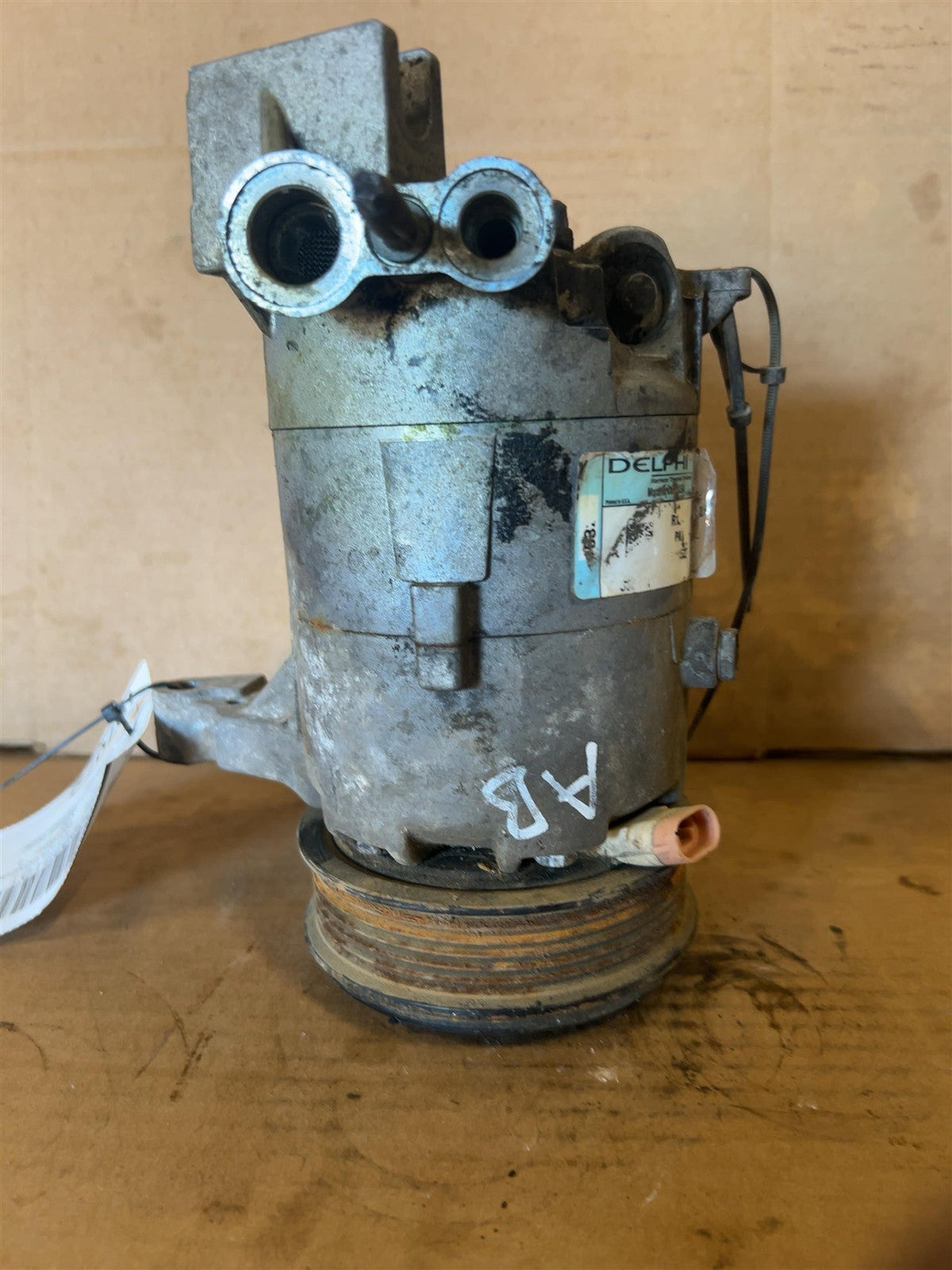 AC Compressor from a 2006 Chevrolet Malibu, photo 1