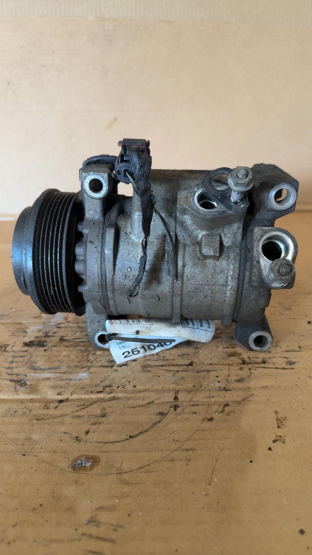 AC Compressor from a 2008 Chrysler Town & Country, photo 1