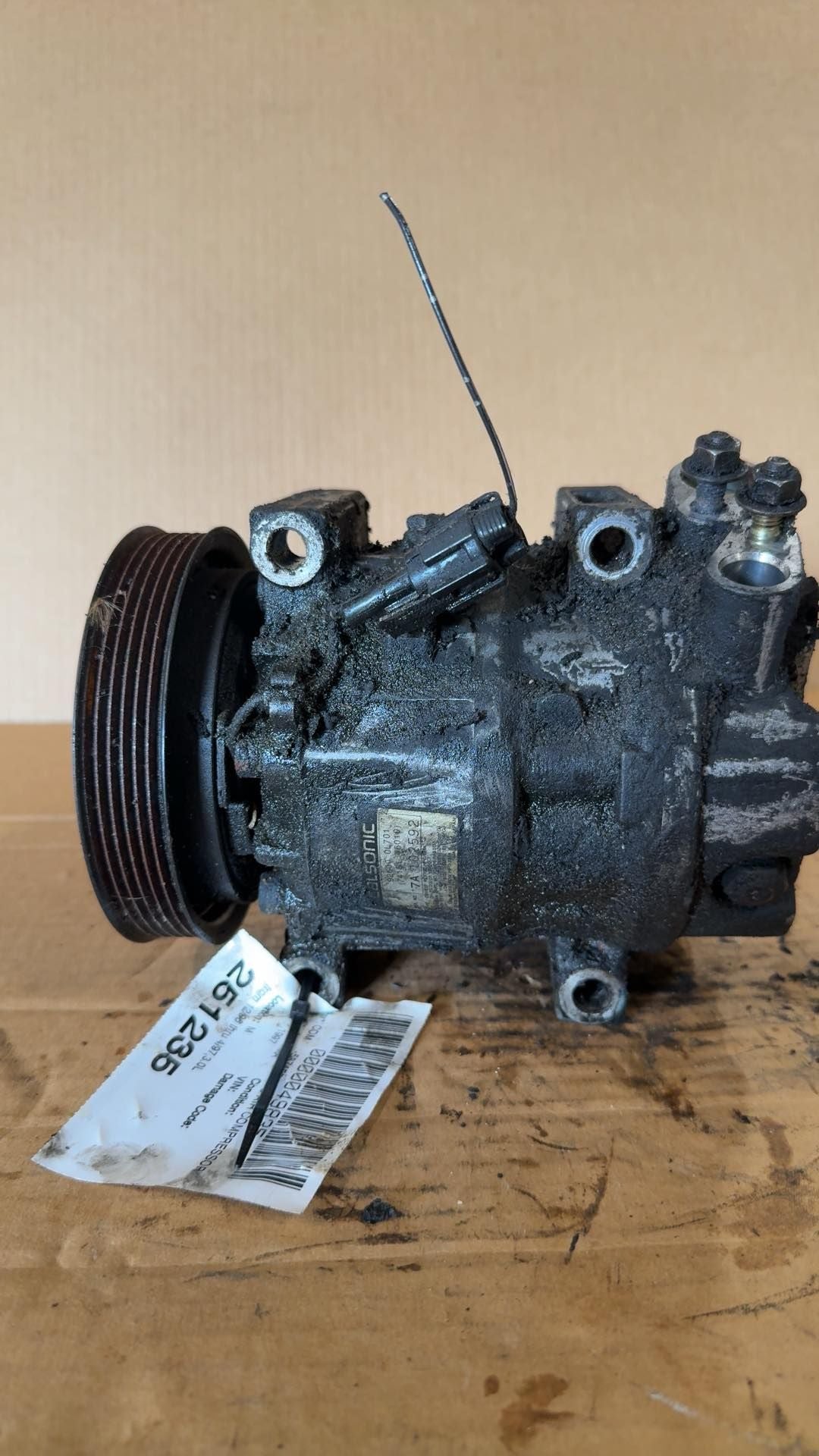 AC Compressor from a 1997 Nissan Maxima, photo 1