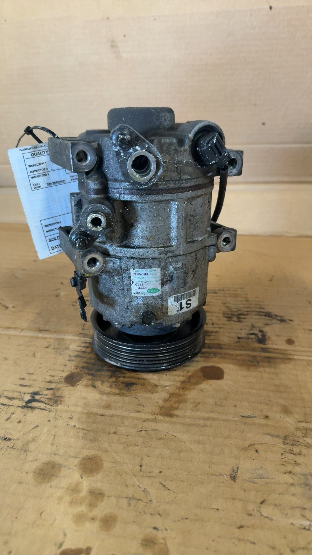 AC Compressor from a 2012 Hyundai Sonata, photo 1