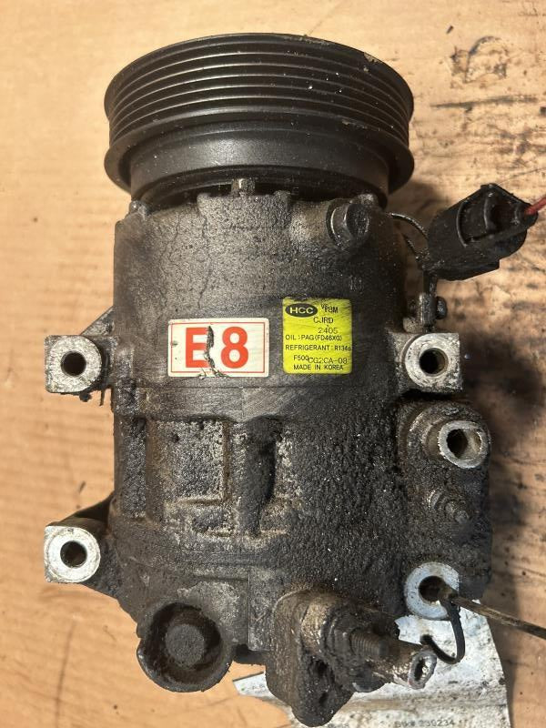 AC Compressor from a 2008 Kia Amanti, photo 1