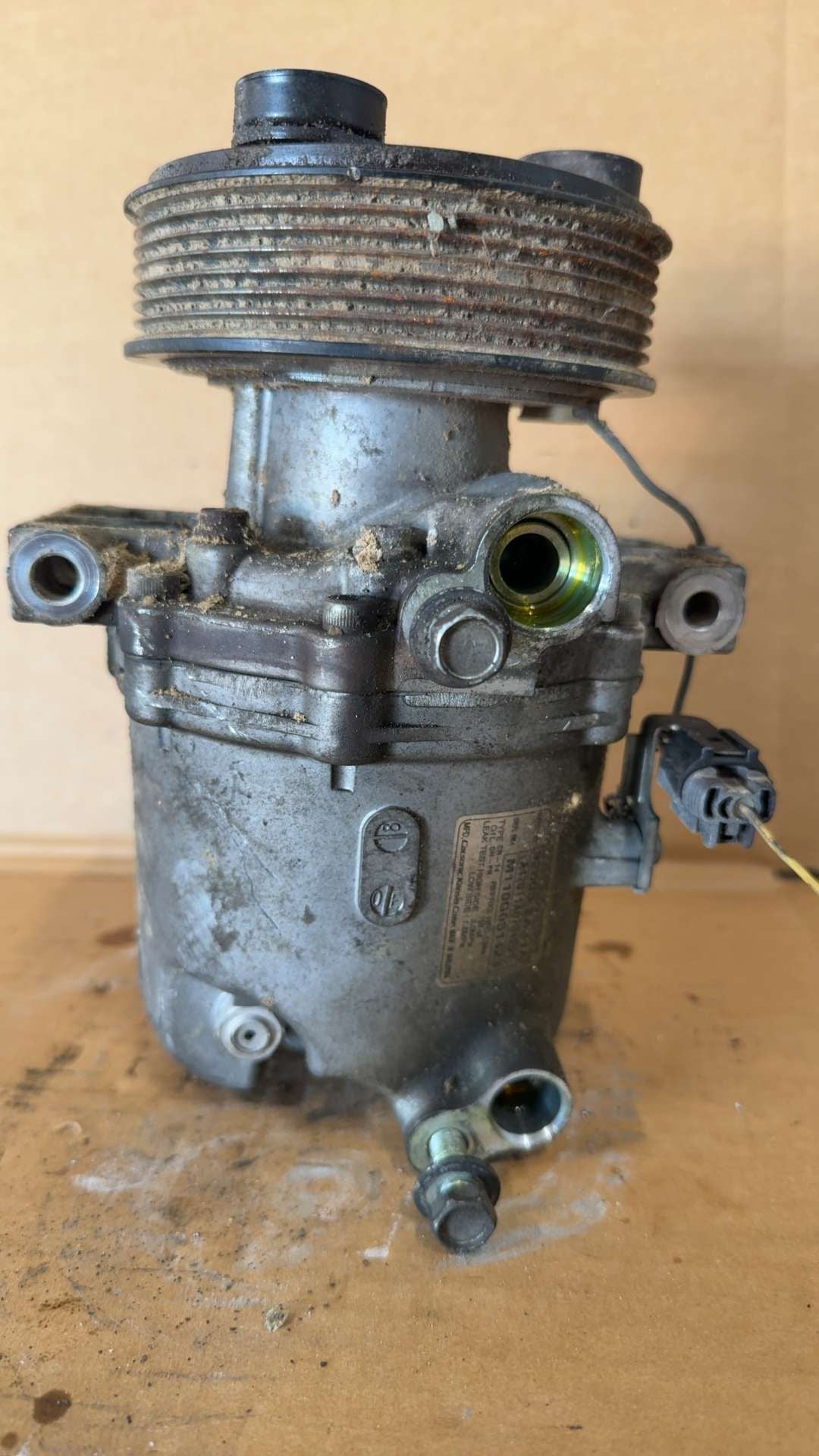 AC Compressor from a 2011 Suzuki Equator, photo 1