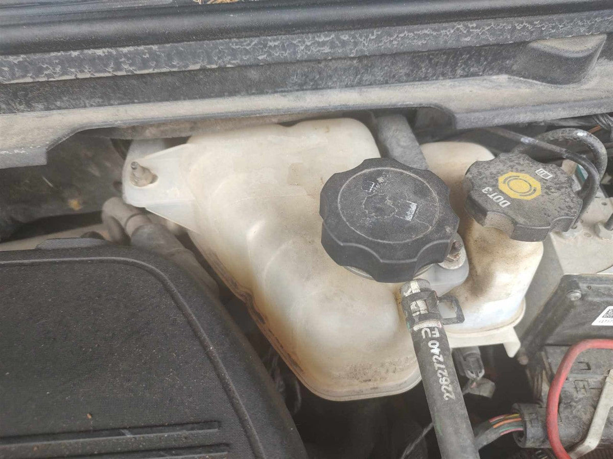 Coolant Reservoir from a 2010 Chevrolet Malibu, photo 1