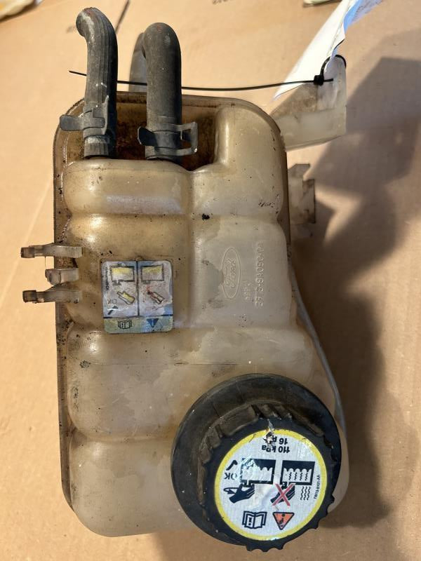 Coolant Reservoir from a 2003 Ford Taurus, photo 1