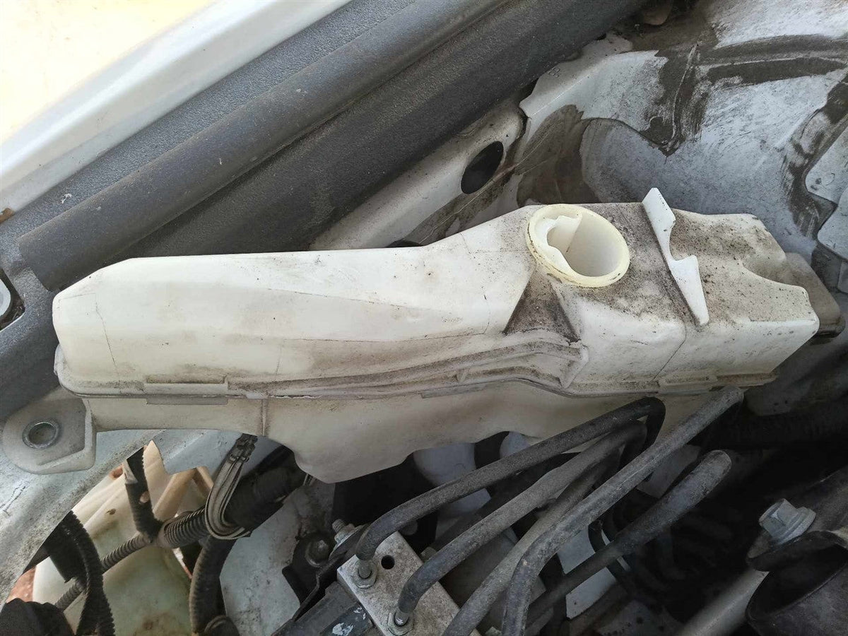 Coolant Reservoir from a 2014 Toyota Camry, photo 1
