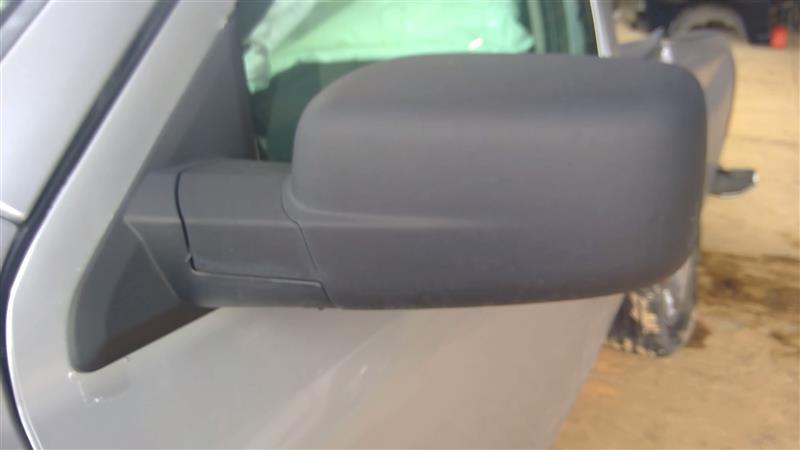 Side View Mirror from a 2012 Ram 1500, left side, photo 1