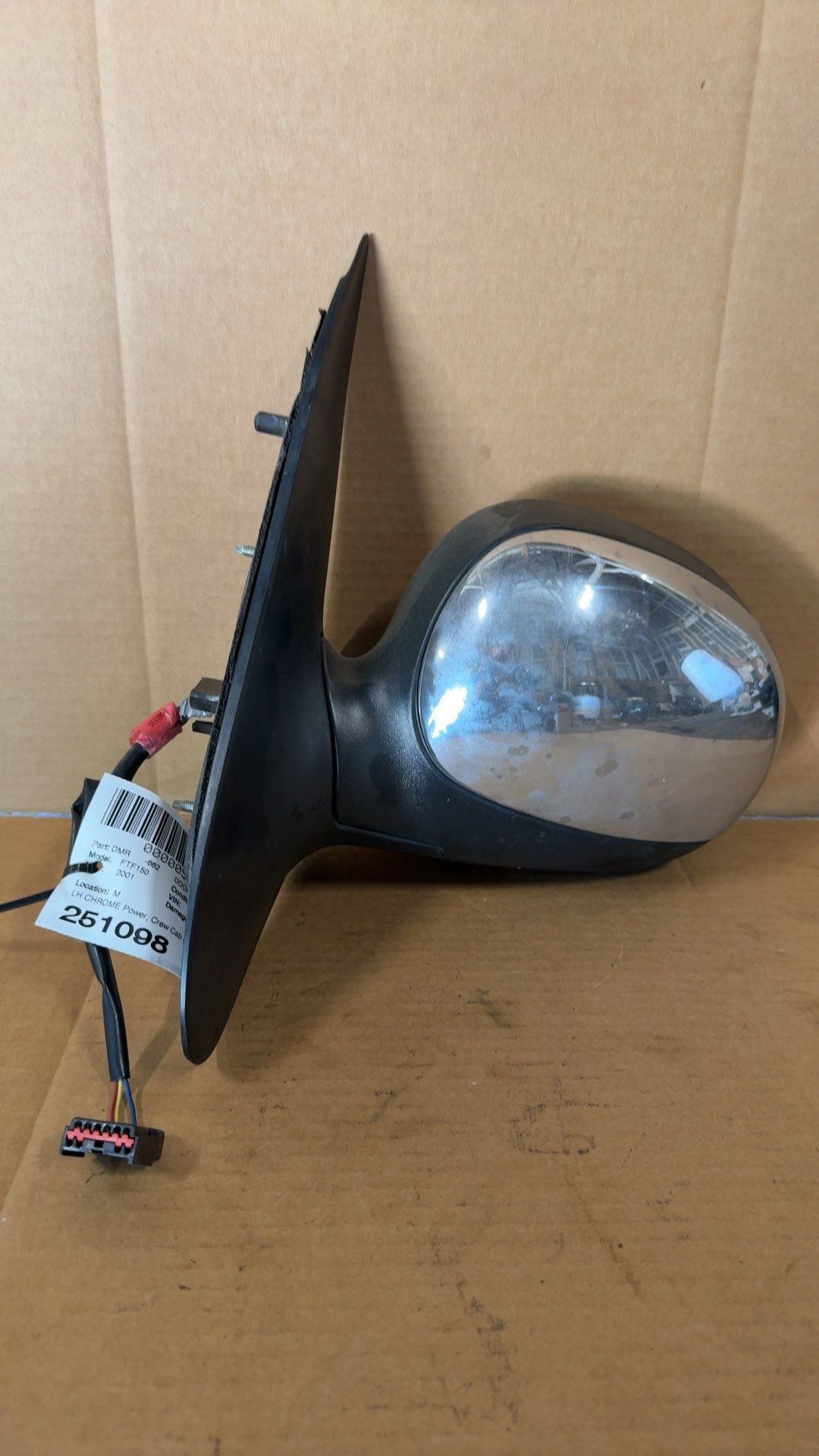 Side View Mirror from a 2001 Ford F-150, left side, photo 1