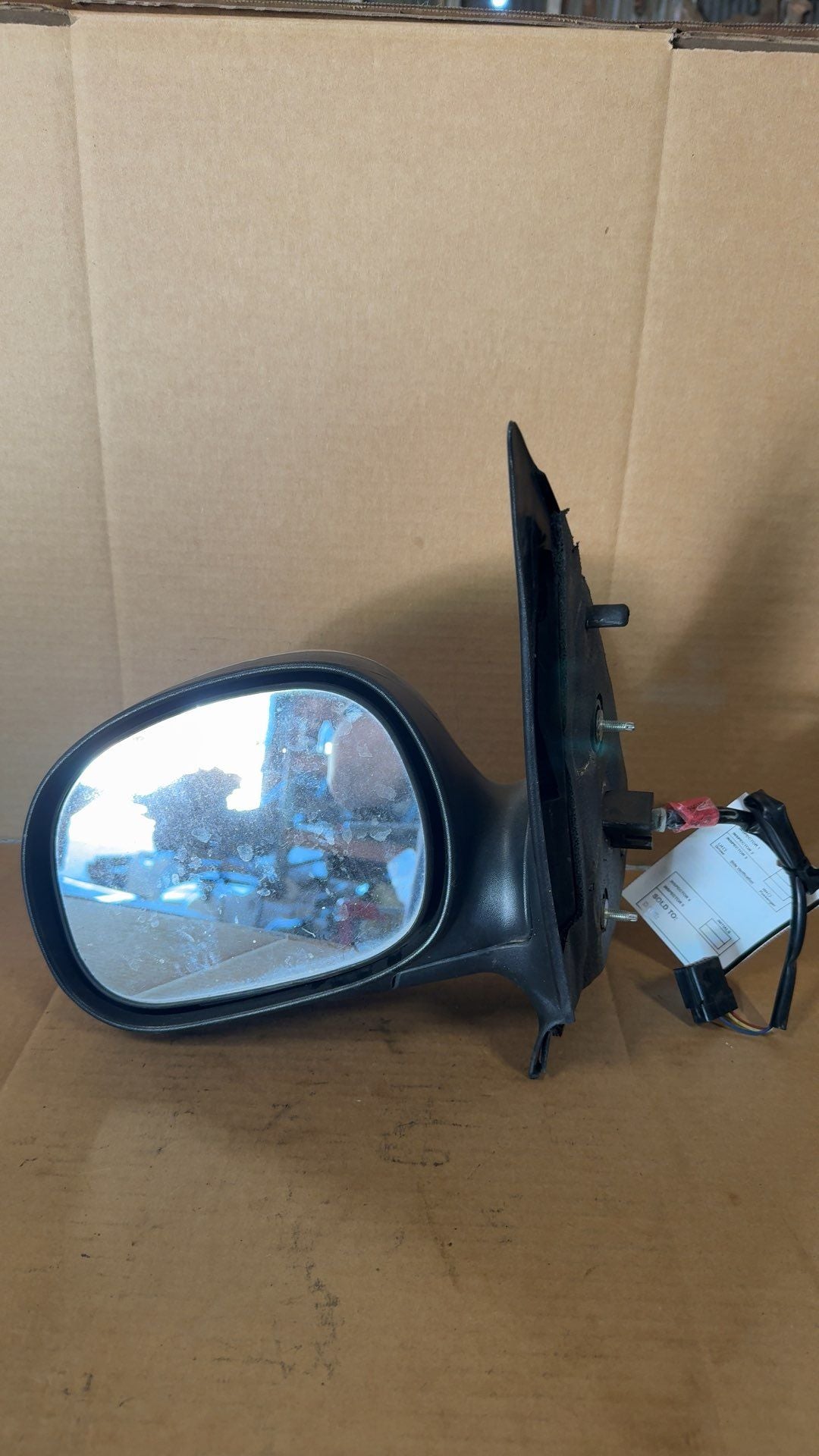 Side View Mirror from a 2001 Ford F-150, left side, photo 2