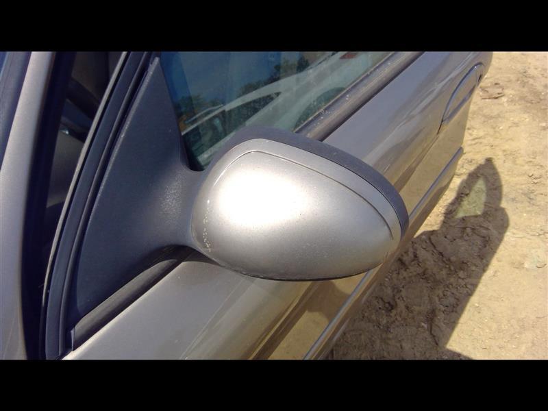 Side View Mirror from a 2002 Ford Taurus, left side, photo 1