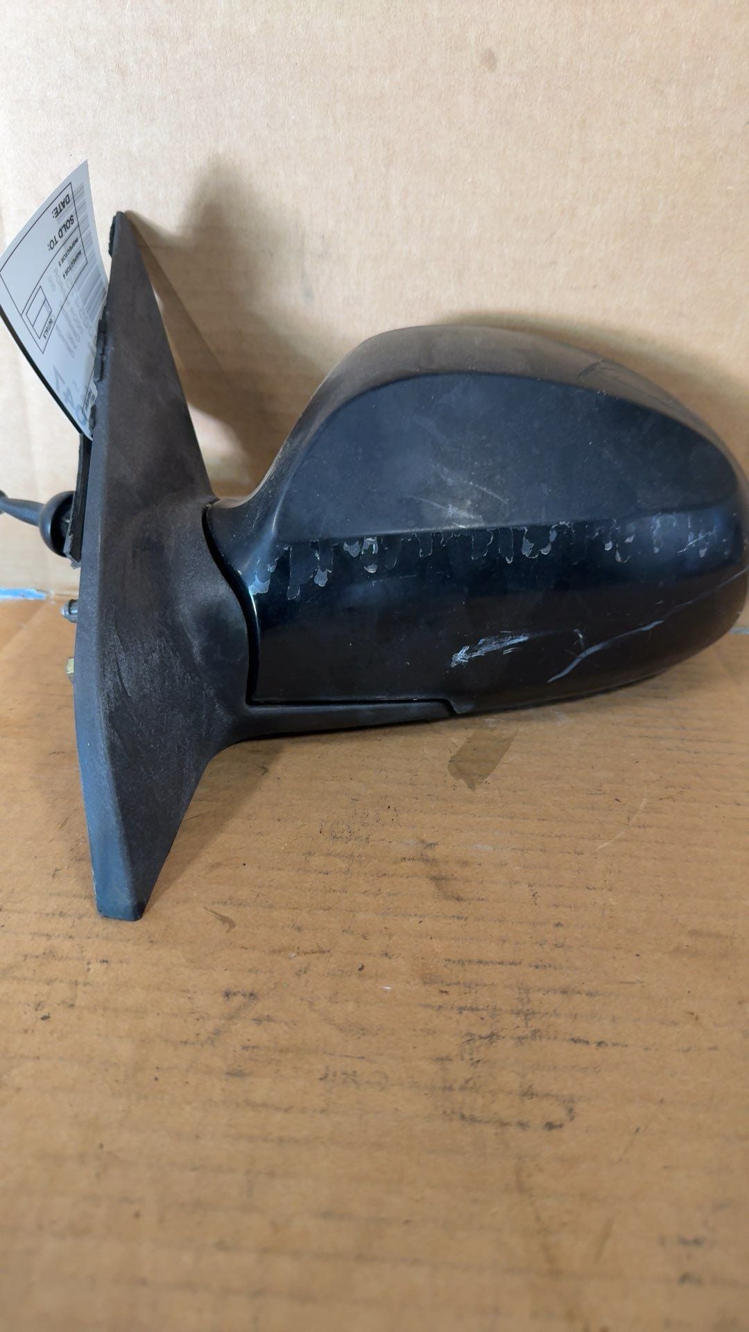 Side View Mirror from a 2005 Kia Spectra, left side, photo 1