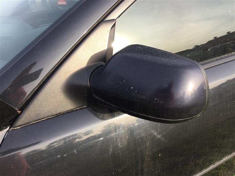 Side View Mirror from a 2004 Mazda 3, left side, photo 1