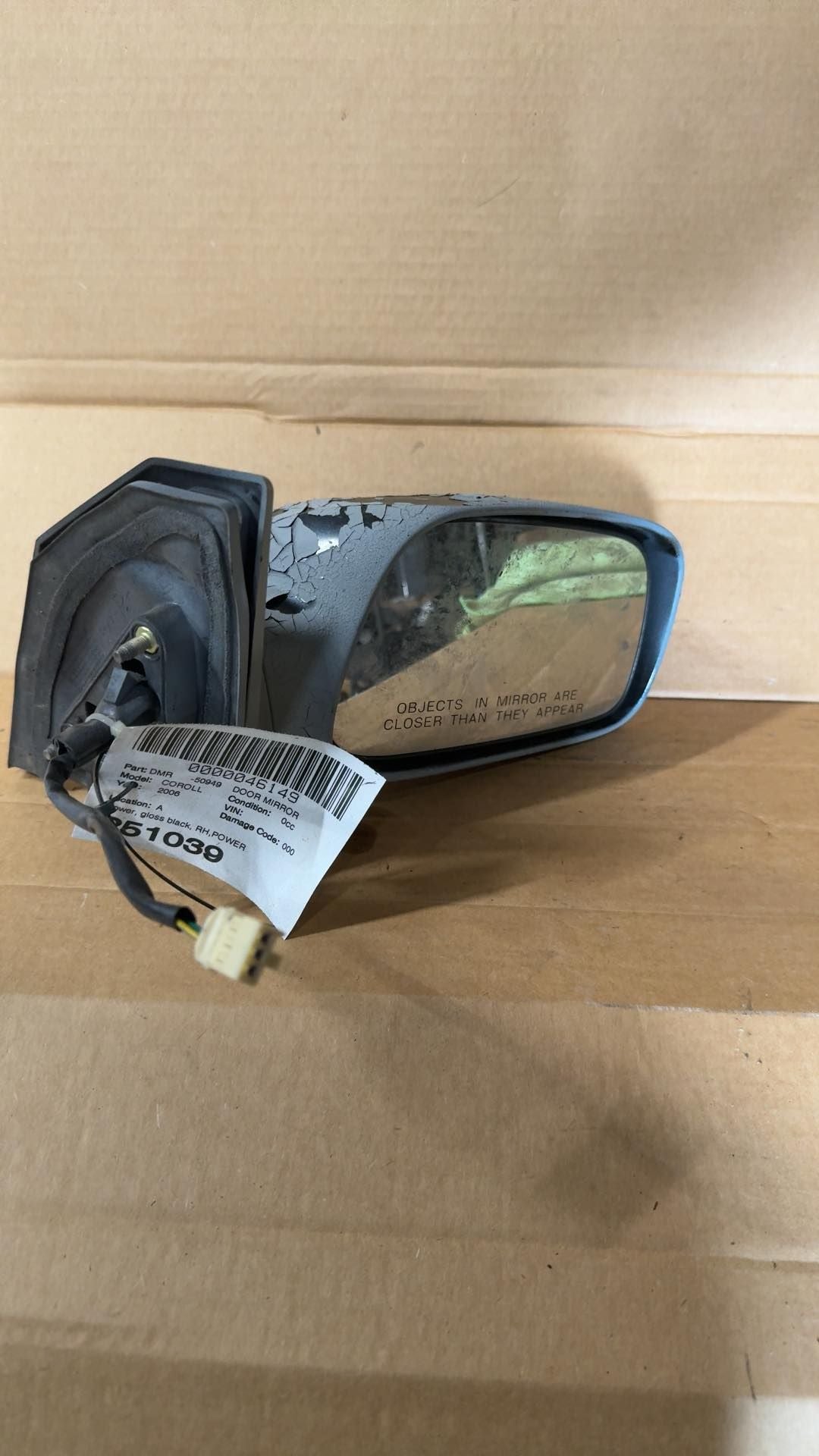 Side View Mirror from a 2006 Toyota, right side, photo 3