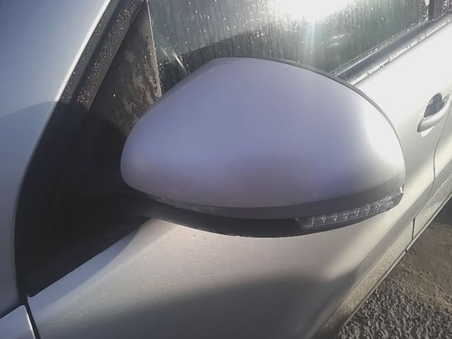 Side View Mirror from a 2013 Volkswagen Tiguan, left side, photo 1