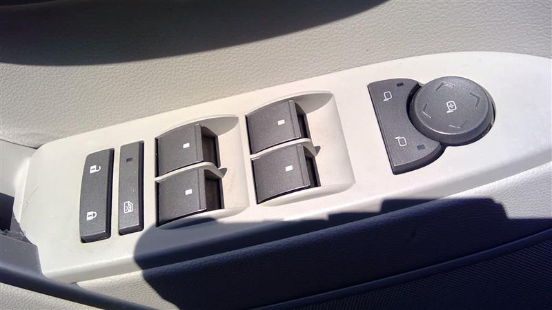 Window Master Switch from a 2009 Cadillac CTS, left side, photo 1