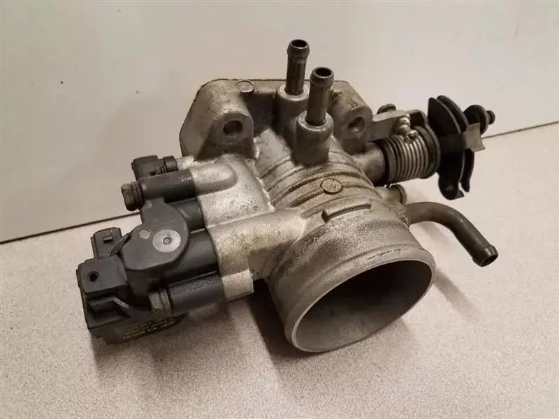 Throttle Body Valve Housing 1.8L 4 Cylinder Fits 2002-2004 Kia SPECTRA WARRANTY - Used OEM Auto Part