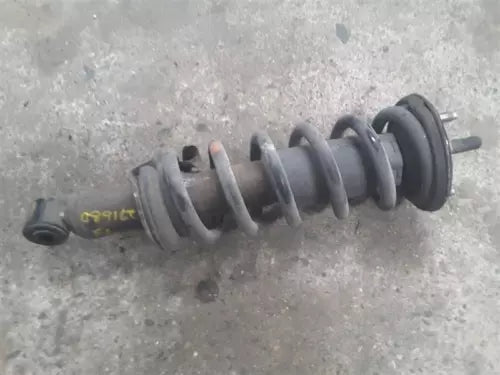 2005-2021 Nissan Frontier Front Driver Left Strut Cartridge Assembly OEM - Used