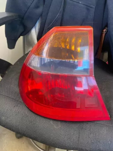 2001-2004 Chrysler 300M Rear Left Tail Light Assembly Pre-owned. - Used OEM Auto Part
