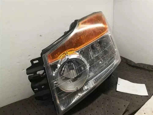 2008-2015 Nissan Armada Front Left Hand Headlight Assembly OEM - Used