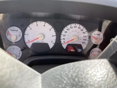 2006 Dodge Ram 1500 Speedometer Cluster (MPH) w/power locks OEM - Used