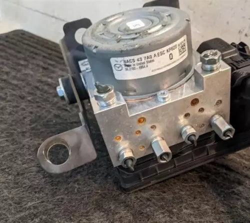 2017-2018 Mazda 3 Mexio Built Anti-Lock brake pump assembly OEM With TPMS - Used